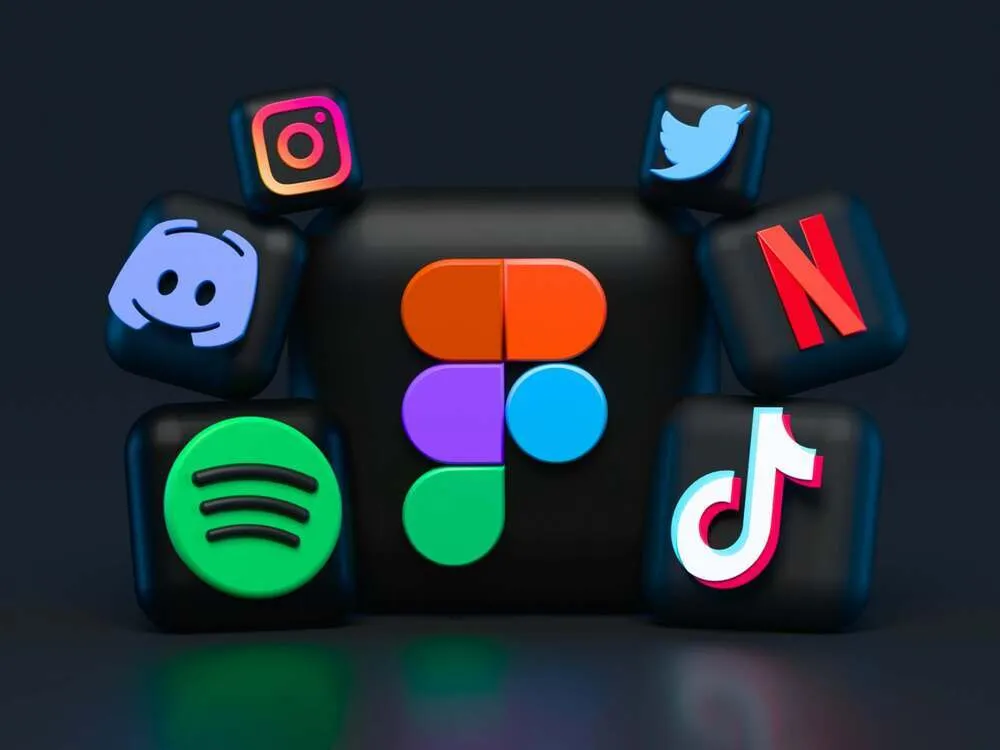 Image showcasing a computer screen displaying social media icons and a graph with increasing engagement levels