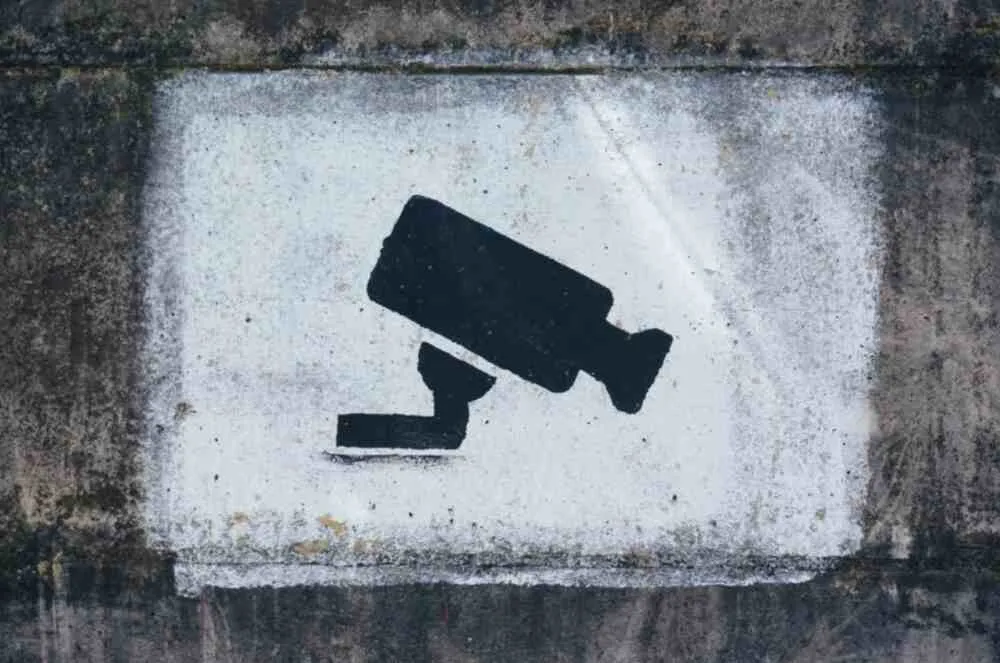 Digital illustration depicting user data privacy concerns with the Disqus comment system on news websites
