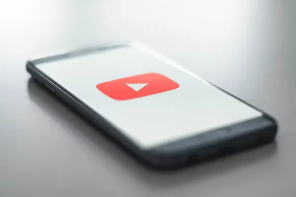 YouTube on a smartphone with a vibrant display, offering seamless streaming and crystal-clear visuals for the ultimate viewing experience.
